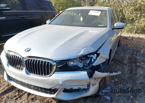 2018 BMW 740E xDrive Iperformance из США, поврежденный, VIN WBA7J2C5XJG938155